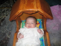 Canon PowerShot S400, 2003:12:21 16:59:08 -- 1/60 sec, f/2.8.  Flash, Auto, Red-Eye Reduce.2272x1704 Red-Eye Reduction (Auto).